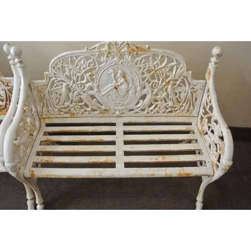 361 - Pair of cast iron garden benches with ornate figured, floral and bird decoration, shaped arms and ho... 