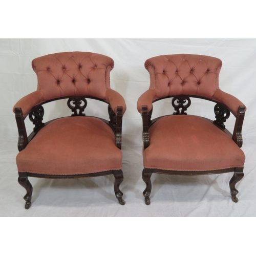 377 - Pair of Victorian upholstered tub chairs with buttoned backs, pierced splats, on cabriole legs