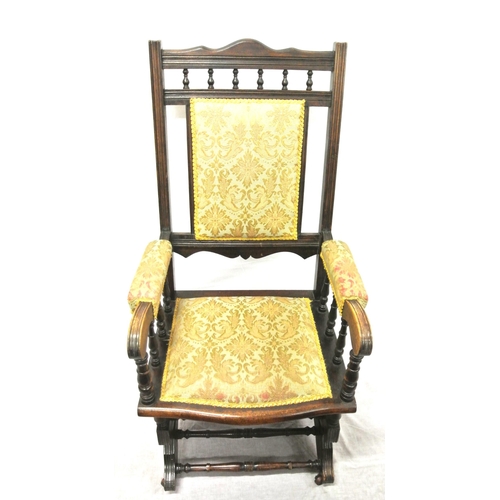 380 - Victorian style rocking armchair with turned rails, floral upholstery, on shaped base