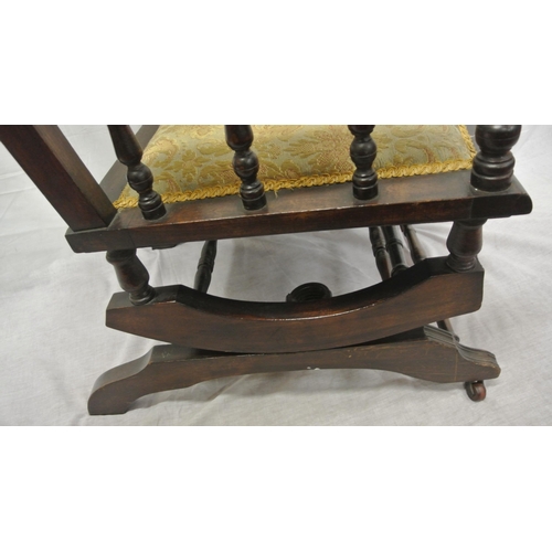 380 - Victorian style rocking armchair with turned rails, floral upholstery, on shaped base