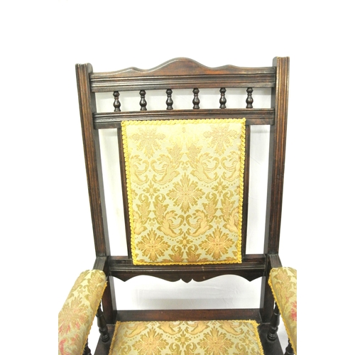 380 - Victorian style rocking armchair with turned rails, floral upholstery, on shaped base