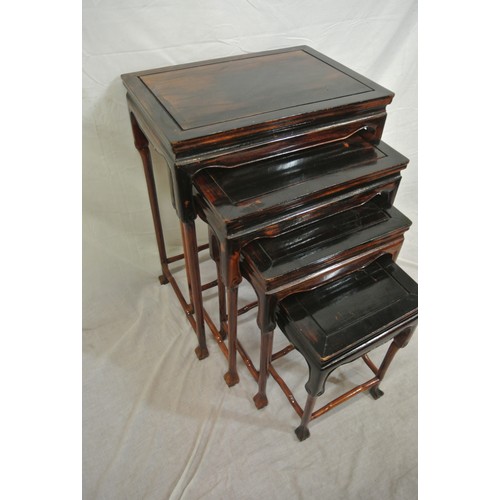 336 - Oriental style mahogany nest of 4 tables of graduating sizes, shaped legs with stretchers