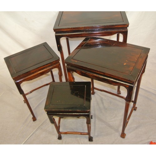 336 - Oriental style mahogany nest of 4 tables of graduating sizes, shaped legs with stretchers