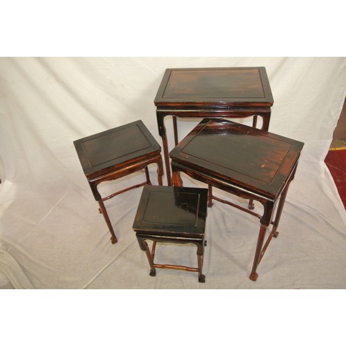 336 - Oriental style mahogany nest of 4 tables of graduating sizes, shaped legs with stretchers