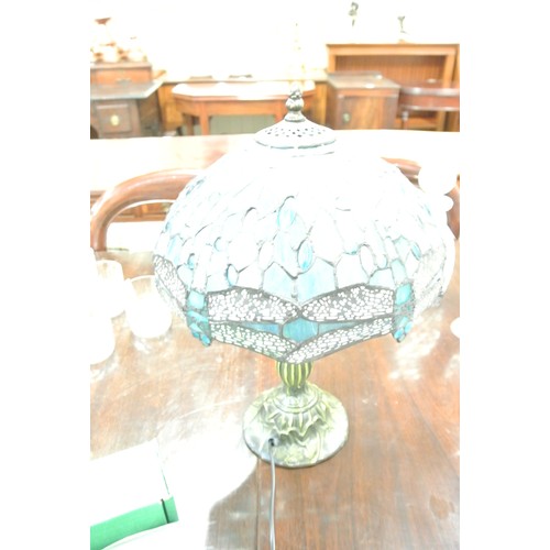 292 - Art deco style bronzed electric lamp with panelled coloured shade and butterfly decoration