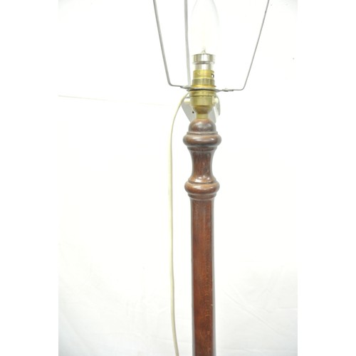 128 - Tall mahogany standard lamp with turned reeded column and base