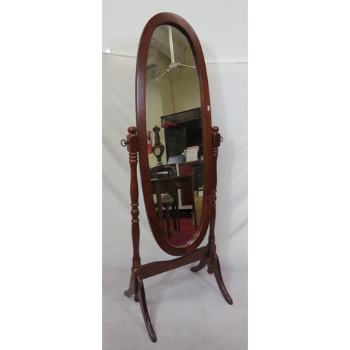 104 - Oval mahogany framed cheval mirror with turned columns and shaped legs