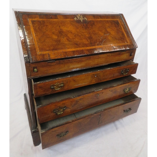 115 - Georgian walnut & mahogany crossbanded bureau with ornate brass escutcheon & brass drop handles, dro... 