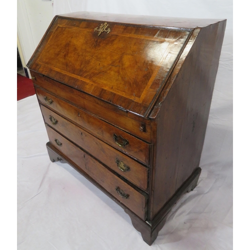 115 - Georgian walnut & mahogany crossbanded bureau with ornate brass escutcheon & brass drop handles, dro... 