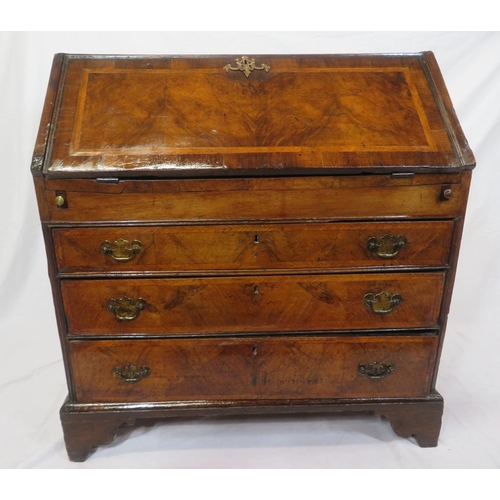 115 - Georgian walnut & mahogany crossbanded bureau with ornate brass escutcheon & brass drop handles, dro... 