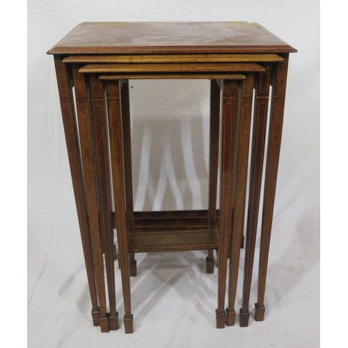 131 - Quarteto nest of crossbanded mahogany tables with inlaid square tapering legs & spade feet