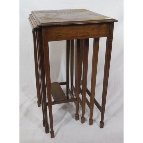 131 - Quarteto nest of crossbanded mahogany tables with inlaid square tapering legs & spade feet