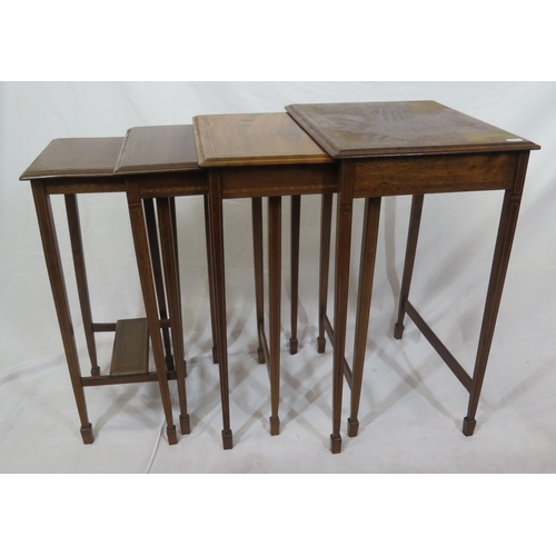 131 - Quarteto nest of crossbanded mahogany tables with inlaid square tapering legs & spade feet