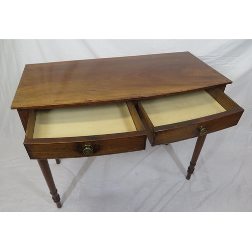 150 - Victorian mahogany bow fronted hall or side table with frieze drawers, brass handles, on turned legs