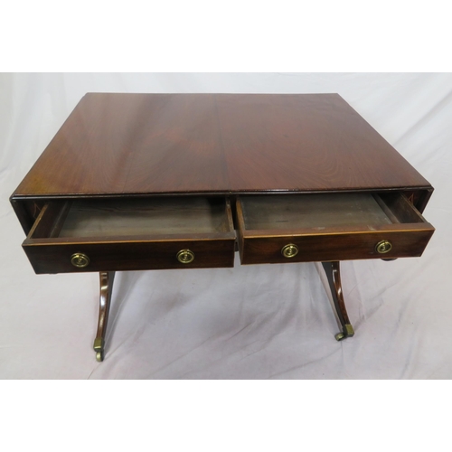 155 - Edwardian mahogany sofa table with reeded borders, drop leaves with pull-out supports, frieze drawer... 