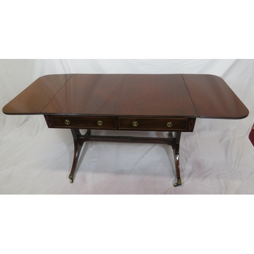 155 - Edwardian mahogany sofa table with reeded borders, drop leaves with pull-out supports, frieze drawer... 