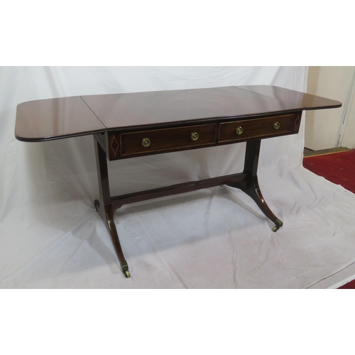 155 - Edwardian mahogany sofa table with reeded borders, drop leaves with pull-out supports, frieze drawer... 