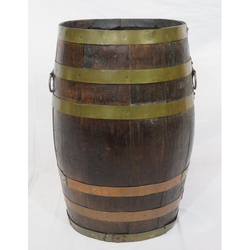 172 - Georgian round peat bucket of oval form with brass banding & shaped handles