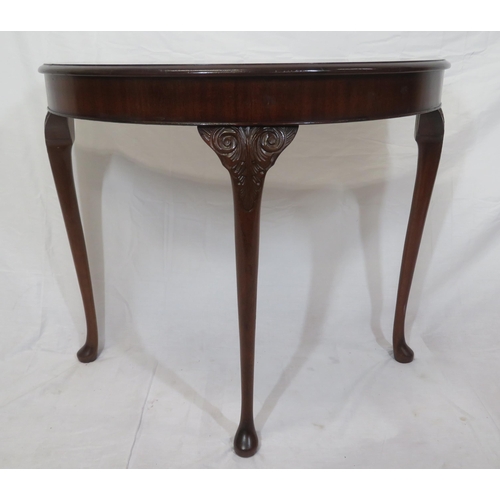 186 - Edwardian mahoany demi lune hall or side table with scroll knuckles, on cabriole legs with pad feet