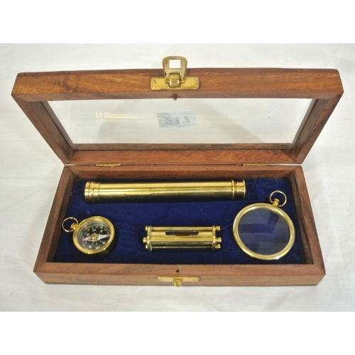 217 - Mariners brass presentation set in glass topped presentation  case