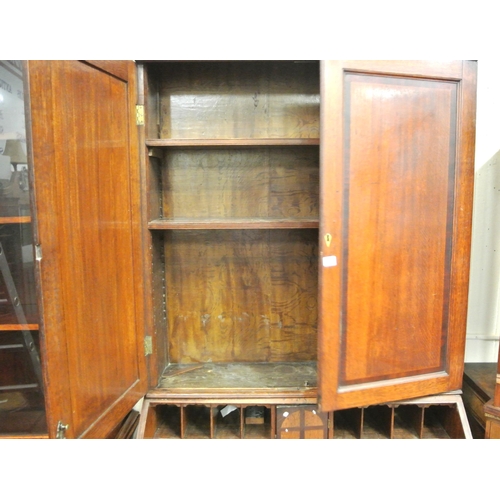 230 - Georgian crossbanded oak bureau bookcase, the top with panelled doors & shelved interior, drop-down ... 