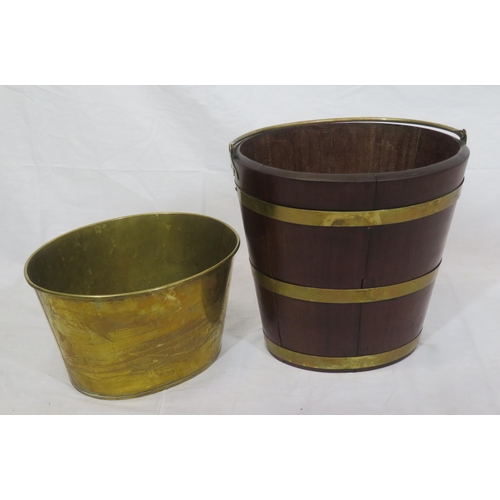 258 - Georgian mahogany oval peat bucket of tapering form with brass banding & handle, & brass bucket inse... 