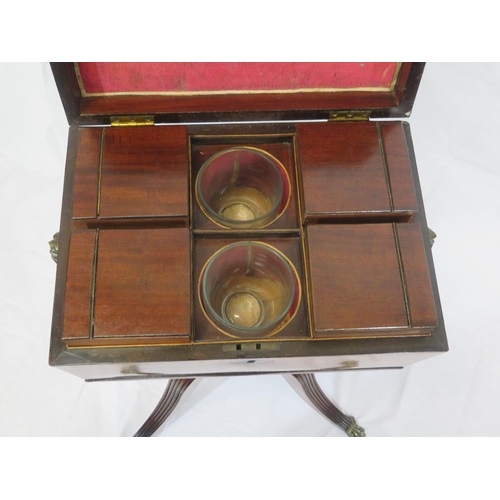 259 - Georgian inlaid mahogany teapoy with sarcophagus shaped lift-up lid, brass handle, 4 tea boxes with ... 