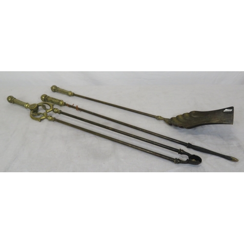 72 - Set of 3 Victorian style brass fire implements with ornate pierced handles and a pair of brass rests