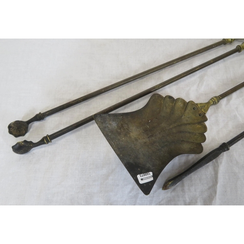 72 - Set of 3 Victorian style brass fire implements with ornate pierced handles and a pair of brass rests