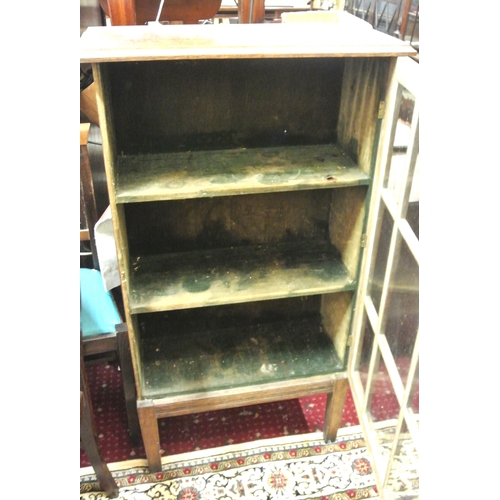 73 - Edwardian style oak display cabinet with glazed door,shelved interior, on square tapering legs