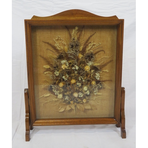 79 - Edwardian firescreen with dried flower arrangement, behind glass, on bracket feet