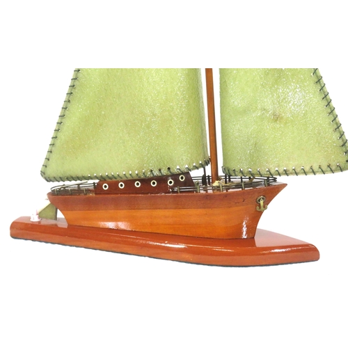 93 - Art Deco style timber electric lamp in the form of a sailing boat, on shaped base