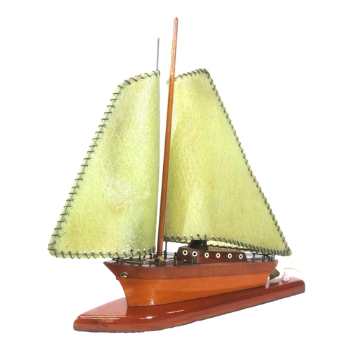 93 - Art Deco style timber electric lamp in the form of a sailing boat, on shaped base