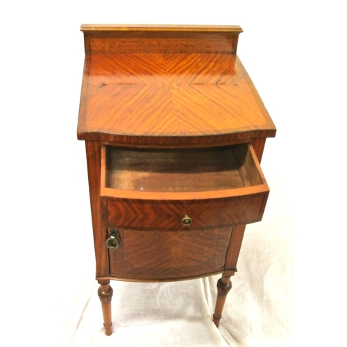 96 - Edwardian mahogany bow fronted locker with frieze drawer, shelved press under, drop handle, on turne... 