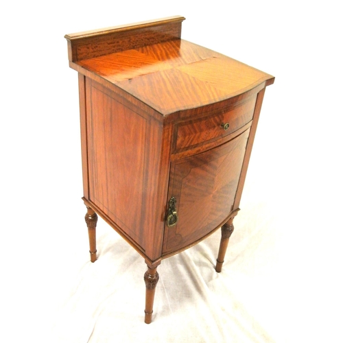 96 - Edwardian mahogany bow fronted locker with frieze drawer, shelved press under, drop handle, on turne... 