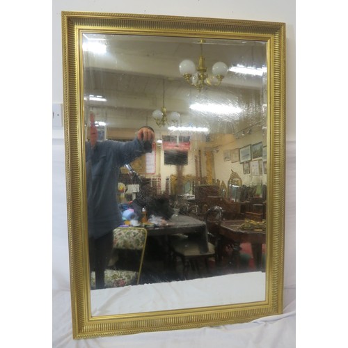 137 - Regency design gilt framed bevelled glass mirror with reeded & ball decoration