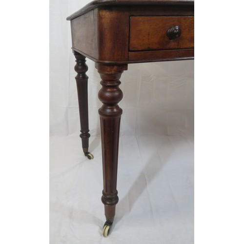 130 - Victorian mahogany side table with frieze drawers, round handles, on turned reeded tapering legs wit... 