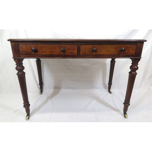 130 - Victorian mahogany side table with frieze drawers, round handles, on turned reeded tapering legs wit... 