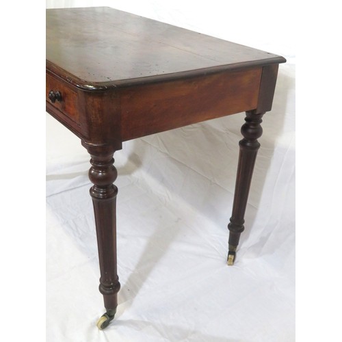 130 - Victorian mahogany side table with frieze drawers, round handles, on turned reeded tapering legs wit... 