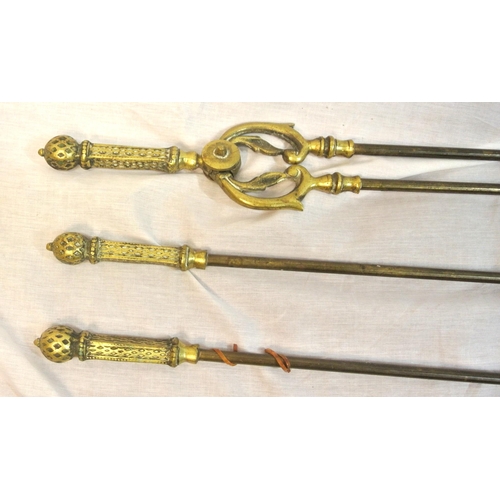 149 - Set of 3 Edwardian style brass fire implements with shaped tops