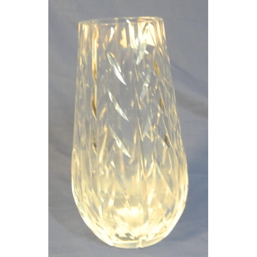 77 - Waterford Crystal heavy cut glass flower vase of round tapering form with faceted decoration