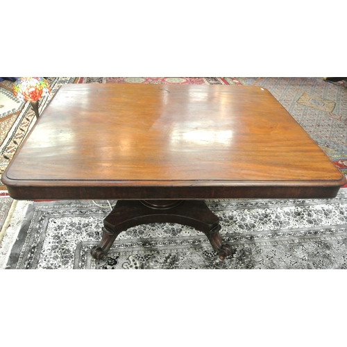 125 - Victorian mahogany dining or library table with tip-up top, hexagonal tapering column with round col... 