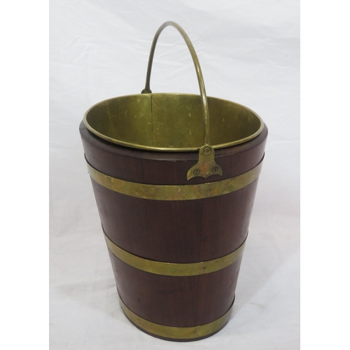 193 - Georgian mahogany oval peat bucket of tapering form with brass banding & handle, & brass bucket inse... 
