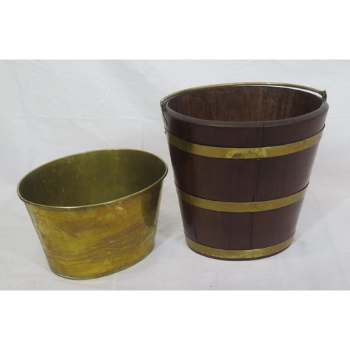 193 - Georgian mahogany oval peat bucket of tapering form with brass banding & handle, & brass bucket inse... 