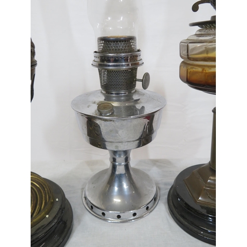 117 - 3 vintage table oil lamps with round bases & shaped glass chimneys