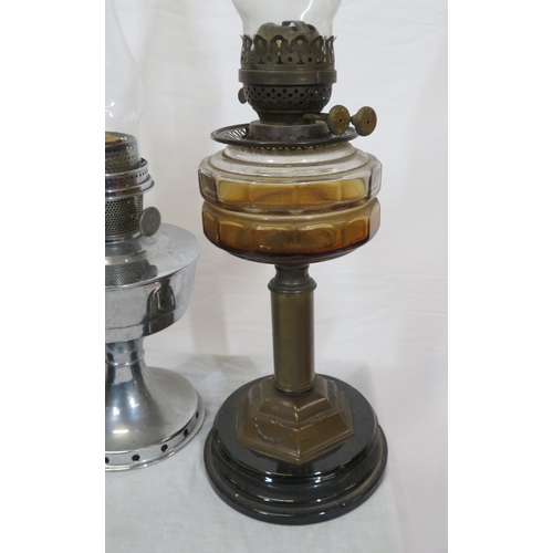 117 - 3 vintage table oil lamps with round bases & shaped glass chimneys