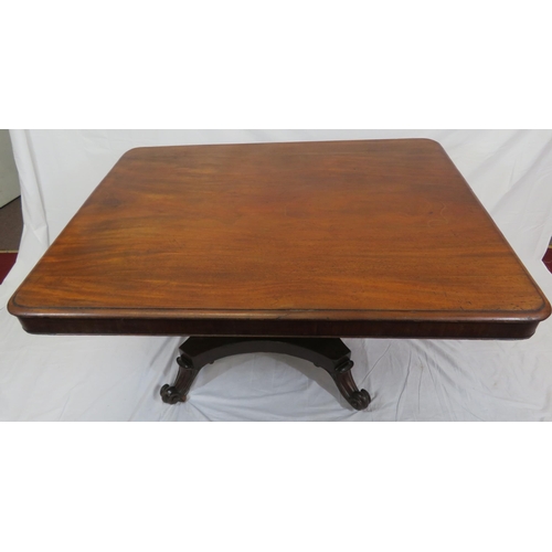 125 - Victorian mahogany dining or library table with tip-up top, hexagonal tapering column with round col... 