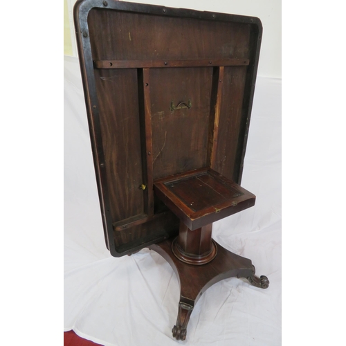 125 - Victorian mahogany dining or library table with tip-up top, hexagonal tapering column with round col... 