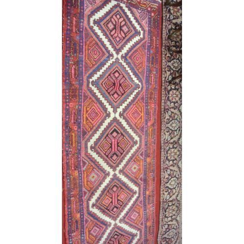 127 - Multi coloured ground Persian Mushwani runner with diamond medallion design 385 x 85cm