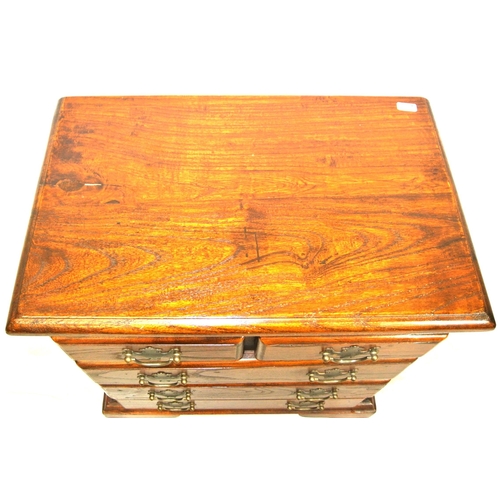 129 - Small oak chest of two short & three long drawers with drop handles, & bracket feet